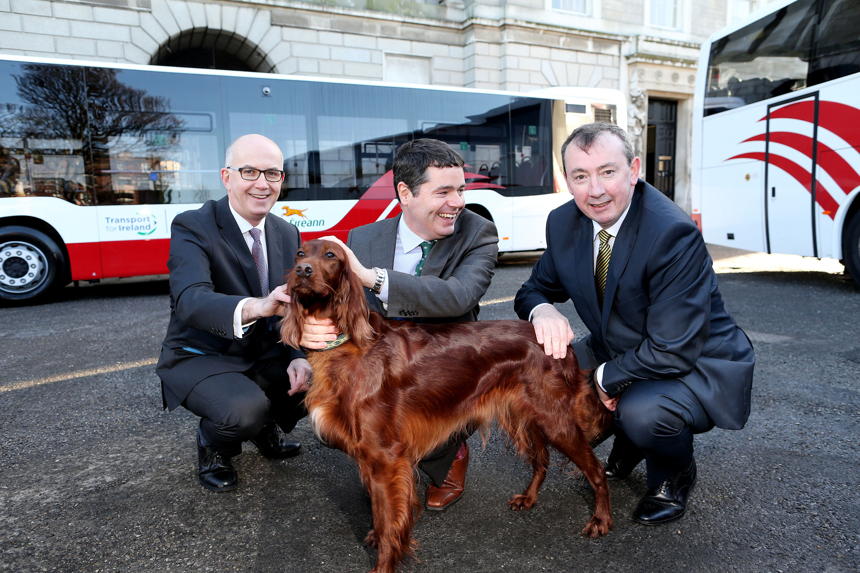 Pictured at the announcement of new vehicles for Bus Éireann are (L-R): Tim Gaston, National Transport Authority, Minister Paschal Donohoe and Martin Nolan, Bus Éireann – and Legend the dog.