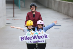 Anne Graham Bikeweek 2 children in bike basket
