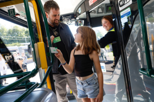 girl and dad on bus with child 5-8 TFI Leap card 02 900x600