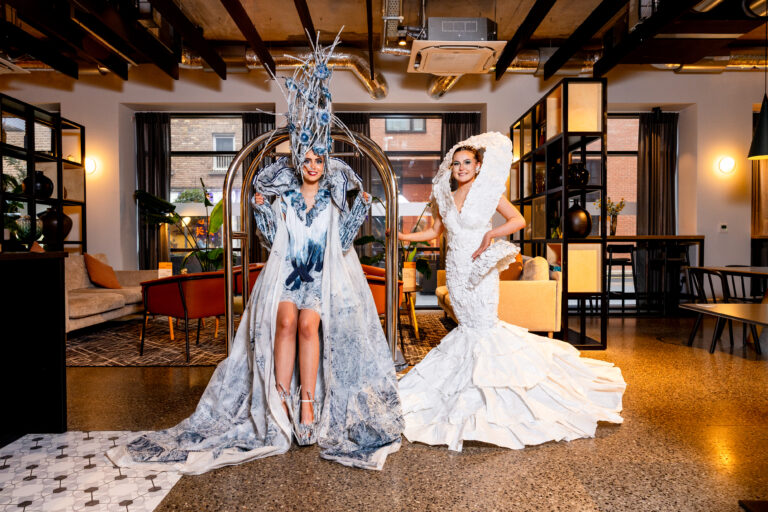 Junk Kouture 2 models in dresses from the show