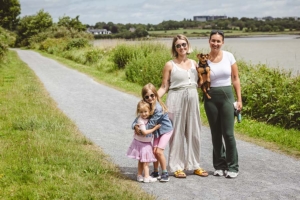 women and children and dog on greenway walking in Waterford
