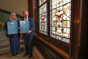 Minister of State S&eacute;an Canney presents the 150th Smarter Travel Mark to the National Library of Ireland (NLI) Dr. Audrey Whitty